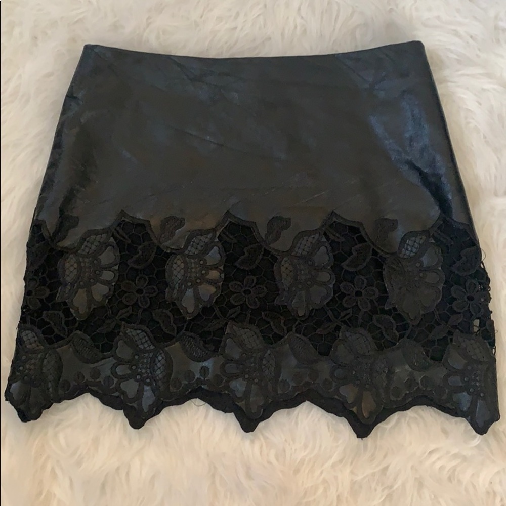 Faux leather mini skirt.  Size S